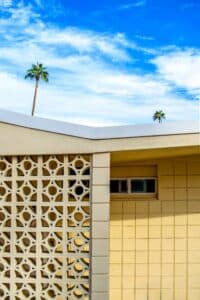 Mid century modern building with palm trees Palm Springs