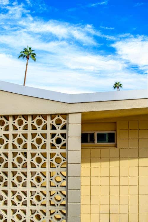 Mid century modern building with palm trees Palm Springs